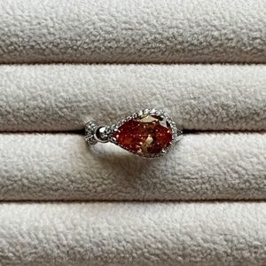 R008 | Amber CZ Pear Stone with Halo Ring